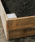 Corner detail of hemlock raised bed built by Garbage to Garden